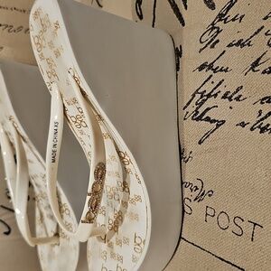 bebe White and Gold Floral Wedge Sandals